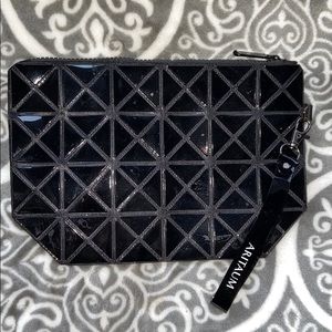 Aritaum clutch